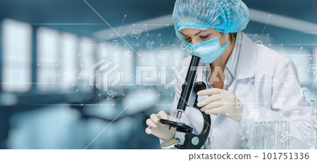 Laboratory assistant examine a sample with a microscope . Laboratory assistant examine a sample with a microscope . 101751336