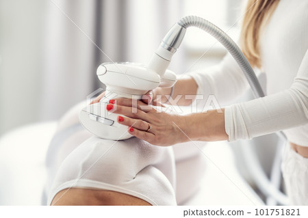 LPG enedermology equipment used for skin beautification of a female client in the cosmetics studio 101751821