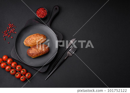Delicious fried cutlets or meatballs from minced fish with spices and herbs 101752122