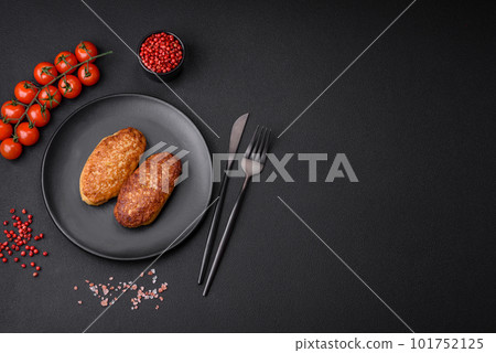 Delicious fried cutlets or meatballs from minced fish with spices and herbs 101752125