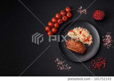 Delicious fried cutlets or meatballs of minced fish with rice 101752143