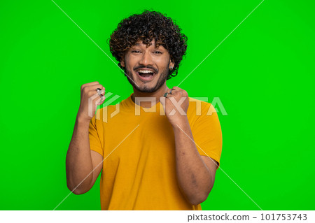 Happy indian man celebrating success, winning, birthday, lottery jackpot goal achievemen, good news Happy indian man celebrating success, winning, birthday, lottery jackpot goal achievemen, good news 101753743