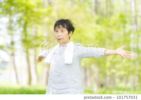 Image of senior woman exercising in park Image of senior woman exercising in park 101757031