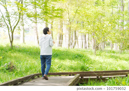 Image of senior woman exercising in park 101759032