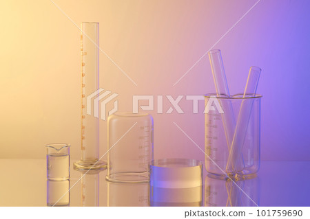 Lab theme with lab glassware - test tubes, beaker and transparent empty podium on gradient background. Blank space for advertising. Science laboratory research and development concept Lab theme with lab glassware - test tubes, beaker and transparent empty podium on gradient background. Blank space for advertising. Science laboratory research and development concept 101759690