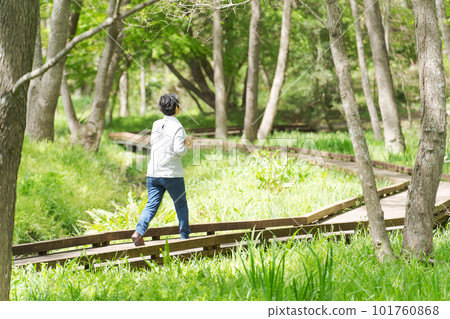Image of senior woman exercising in park 101760868