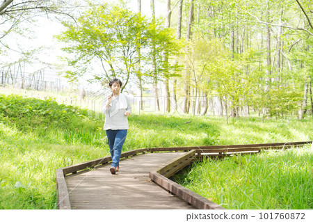 Image of senior woman exercising in park Image of senior woman exercising in park 101760872