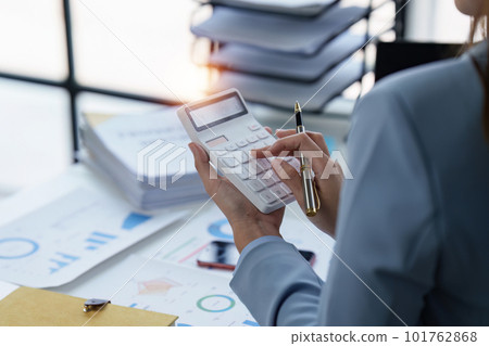 Accountant woman working on laptop and do document, tax, exchange, research, accounting and Financial advisor concept Accountant woman working on laptop and do document, tax, exchange, research, accounting and Financial advisor concept 101762868