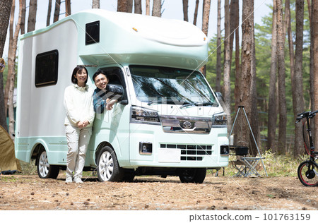 couple traveling by camper couple traveling by camper 101763159