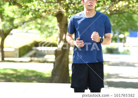 Young man running in nature 101765382
