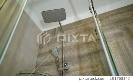 Glass shower inside bathroom. Glass shower in the hotel. Glass shower inside bathroom. Glass shower in the hotel. 101768343