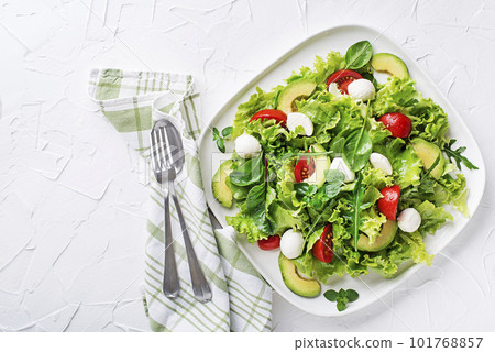 Salad green avocado mozzarella Salad green avocado mozzarella 101768857