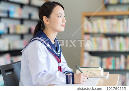 A high school girl studying in the library Photography cooperation: Chuo College of Technology Japanese Language School A high school girl studying in the library Photography cooperation: Chuo College of Technology Japanese Language School 101769335