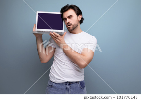 male hardware store manager demonstrating laptop screen mockup male hardware store manager demonstrating laptop screen mockup 101770143