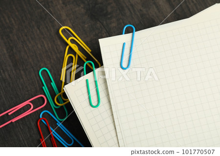 Concept of different office accessories - paper with clip 101770507