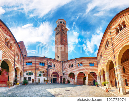 Gorgeous View Torre dei Lamberti clock tower and Medieval stairs of Palazzo della Ragione palace  building in Verona. 101773074