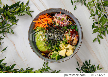Portion of eel poke bowl with vegetables 101773224