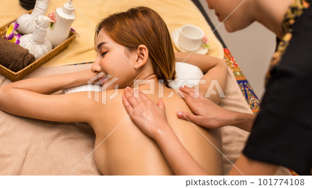 Relaxing with hand massage at beauty spa. Soothing massage, hand of professional massage therapist. 101774108