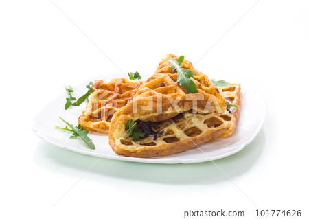 Egg omelette stuffed with onions and herbs, fried in the form of waffles Egg omelette stuffed with onions and herbs, fried in the form of waffles 101774626