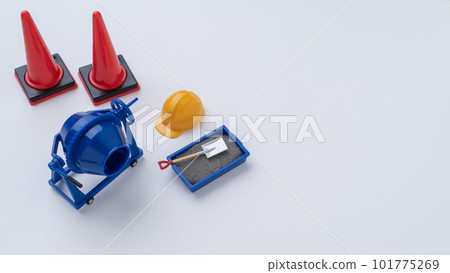 Miniature concrete mixer and triangular cone Construction work image Miniature concrete mixer and triangular cone Construction work image 101775269