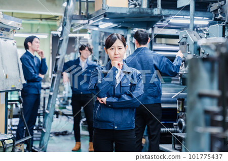 worried workers in the factory 101775437