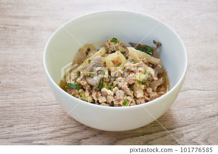 Thai spicy chop pork and slice skin with liver salad on bowl 101776585