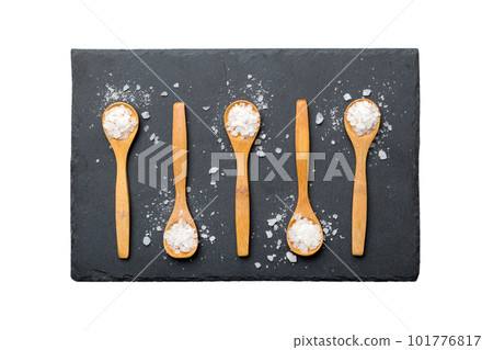 salt on many wooden spoon isolated on white background. Spoons with different salt salt on many wooden spoon isolated on white background. Spoons with different salt 101776817