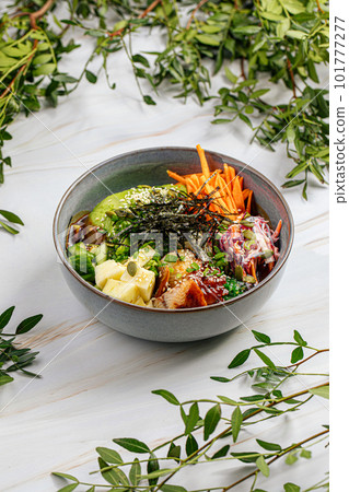 Portion of eel poke bowl with vegetables Portion of eel poke bowl with vegetables 101777277
