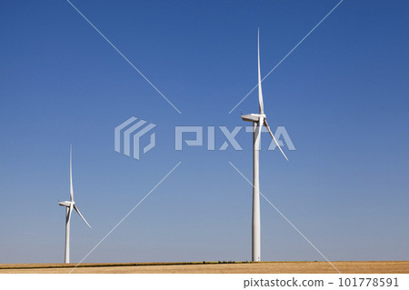 Wind turbines in a field Wind turbines in a field 101778591