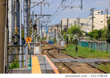 Empty platform of a local single-track station Empty platform of a local single-track station 101778636