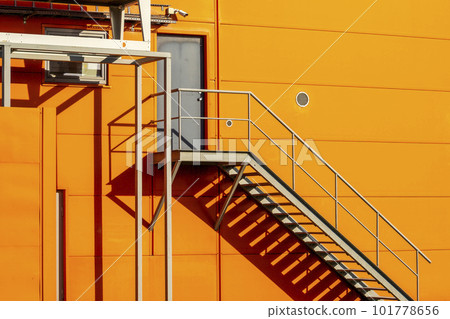 Fire escape ladder or emergency exit with steel staircase 101778656
