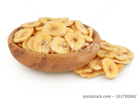 Dried banana chips in wooden bowl isolated on white background with full depth of field Dried banana chips in wooden bowl isolated on white background with full depth of field 101780662
