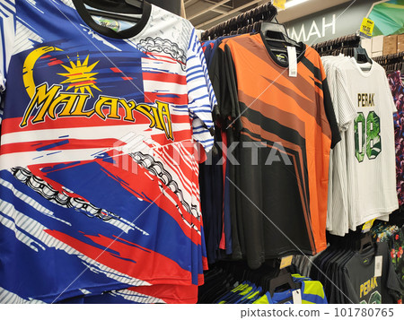 KUALA LUMPUR, MALAYSIA -JULY 8, 2022: Various types of adult men's clothes are hung and displayed for sale. Separated by type and fashion. Have a price tag for customer reference. KUALA LUMPUR, MALAYSIA -JULY 8, 2022: Various types of adult men's clothes are hung and displayed for sale. Separated by type and fashion. Have a price tag for customer reference. 101780765
