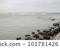 Embankment and wave breaking blocks at the seaside on a cloudy day 101781426