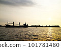 A ship sails at dusk 101781480