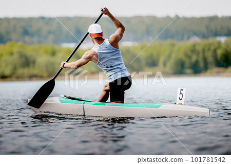 male athlete canoeist on canoe single rowing kayaking race, summer outdoors sports 101781542