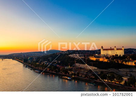 View of Bratislava castle, old town and the Danube river from observation deck the bridge in Bratislava, Slovakia at night 101782001