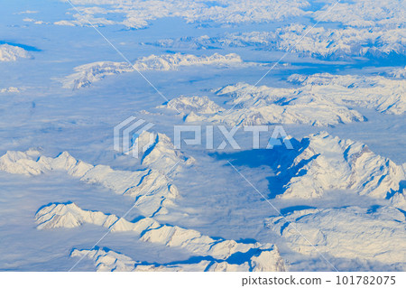 View of the Swiss Alps covered with snow from airplane 101782075
