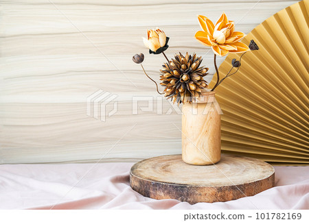 Dried flowers bouquet in wooden vase on tray. Interior details still life. 101782169
