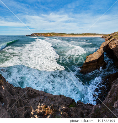 Summer Atlantic ocean coast landscape and Amoreira beach (Aljezur, Algarve, Portugal). 101782305