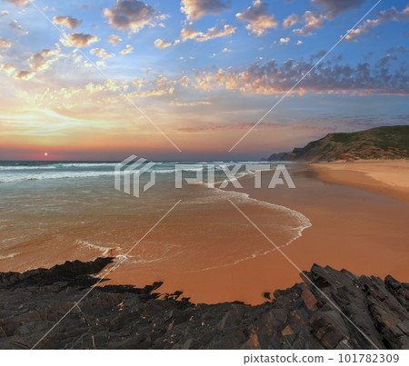 Storm on Castelejo beach with black schist cliffs (Algarve, Portugal). Storm on Castelejo beach with black schist cliffs (Algarve, Portugal). 101782309