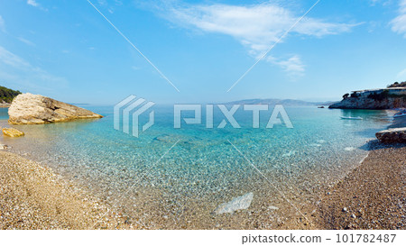 Summer morning pebbly Pulebardha beach view (Saranda, Albania). 101782487