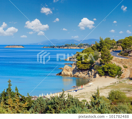 Morning sandy Kaviou beach. Summer top view (Nikiti, Sithonia, Halkidiki, Greece). Morning sandy Kaviou beach. Summer top view (Nikiti, Sithonia, Halkidiki, Greece). 101782488