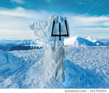 Winter Goverla Mount top and monument to Ukrainian Tryzub. Winter Goverla Mount top and monument to Ukrainian Tryzub. 101783054