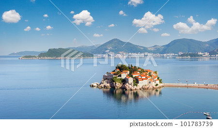 Sveti Stefan sea islet morning summer panorama with Sveti Stefan Beach (Montenegro, 6 kilometres southeast of Budva). Sveti Stefan sea islet morning summer panorama with Sveti Stefan Beach (Montenegro, 6 kilometres southeast of Budva). 101783739