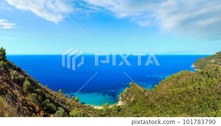 Aegean sea coast landscape and Mount Athos in mist (Chalkidiki, Greece). 101783790