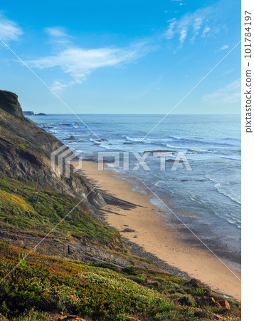 Evening ocean beach (Algarve, Portugal). 101784197