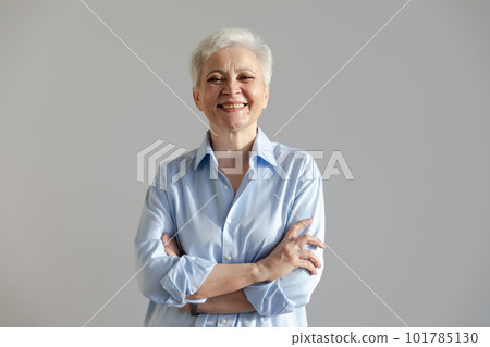 Confident stylish european middle aged senior woman. Older mature 60s lady smiling in white background. Happy attractive senior female looking camera close up face headshot portrait. Happy people Confident stylish european middle aged senior woman. Older mature 60s lady smiling in white background. Happy attractive senior female looking camera close up face headshot portrait. Happy people 101785130