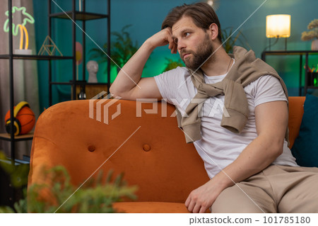 Man guy at home suffers from unfair situation problem, break up, depressed, feeling bad, burnout 101785180