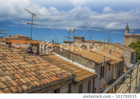 Roofs of old european houses in soft sunlight Roofs of old european houses in soft sunlight 101789535